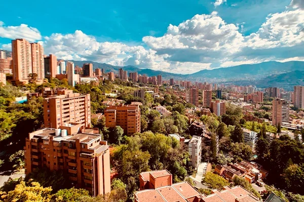 El Poblado neighborhood — Medellín cityscape with mountains